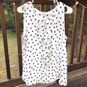 White dotted sleeveless blouse